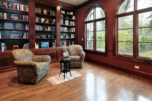 Home library with laminate flooring